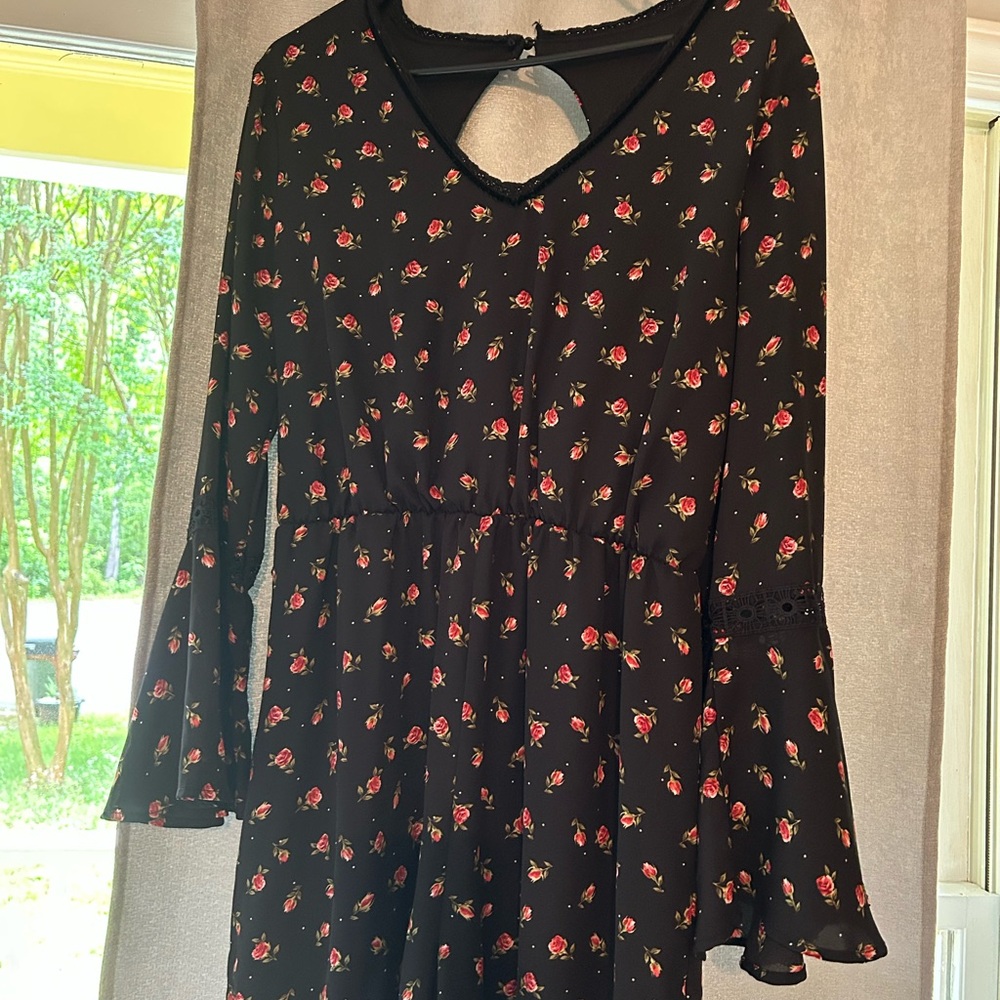 Floral Black Romper with Bell Sleeves